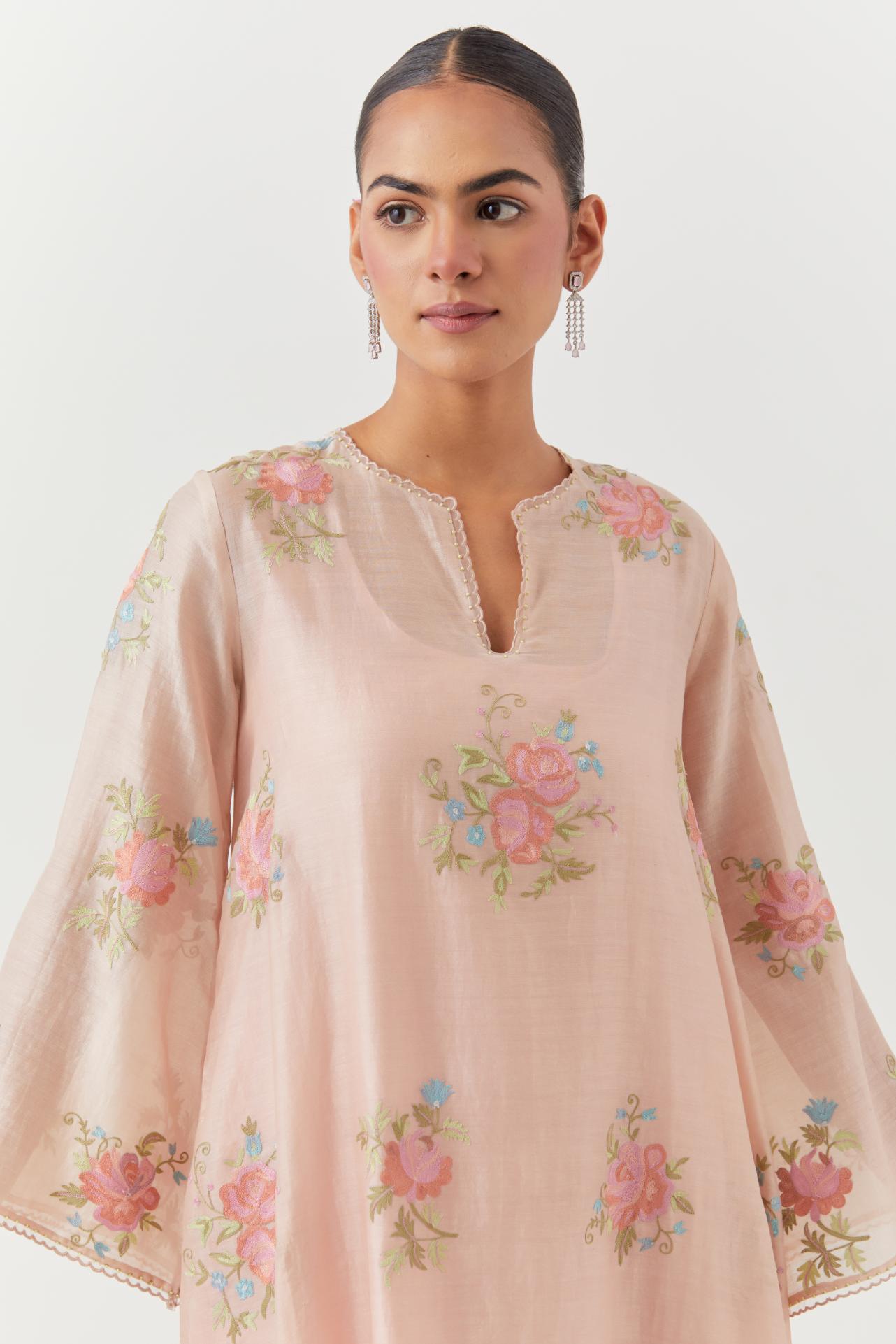 Pink silk chanderi A-line short kurta set, with thread embroidery roses all over.