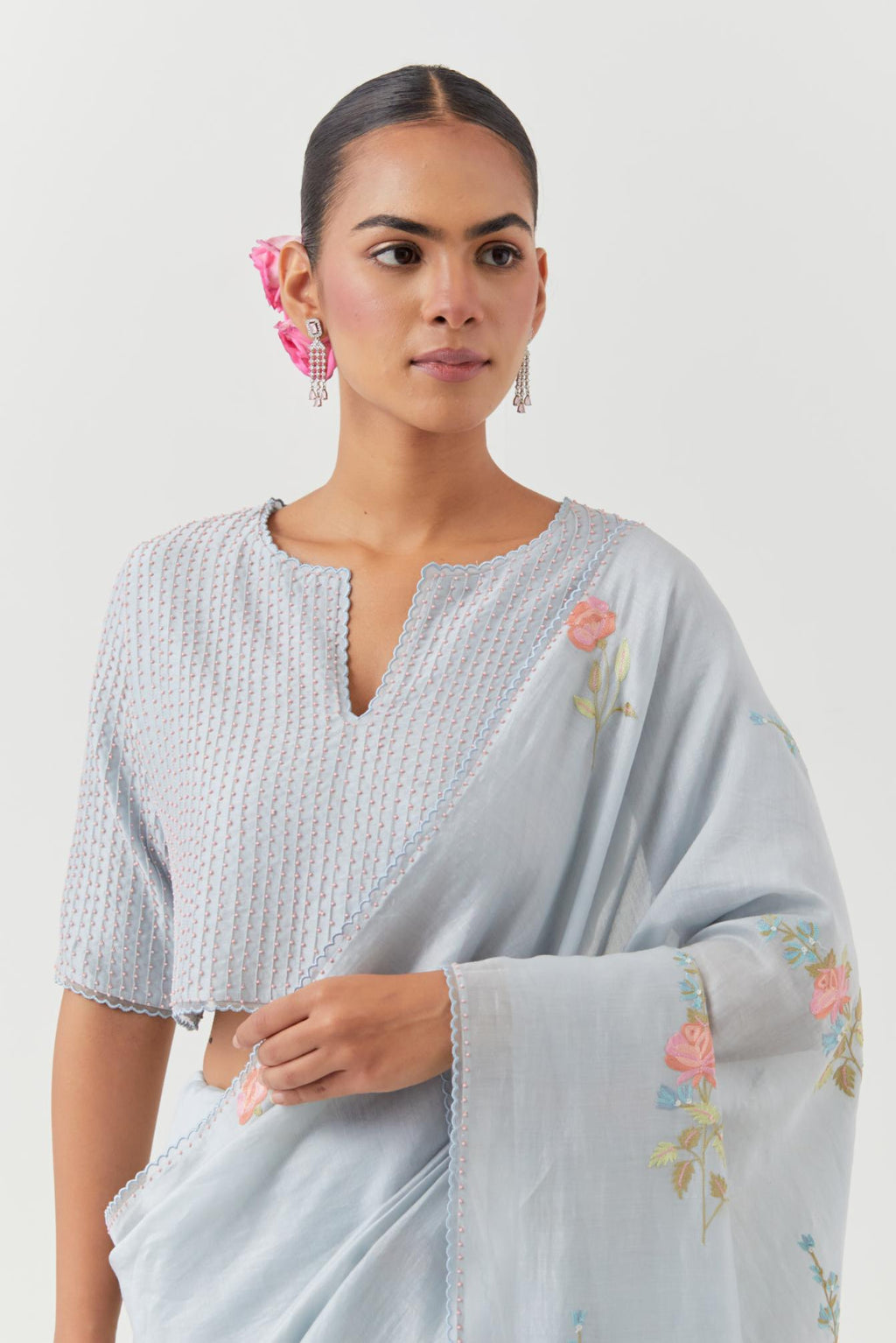 Blue silk chanderi blouse with pin tucks, highlighted with bead work.