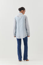 Blue silk chanderi shirt with all-over pin tucks, highlighted with contrast beads in the front.