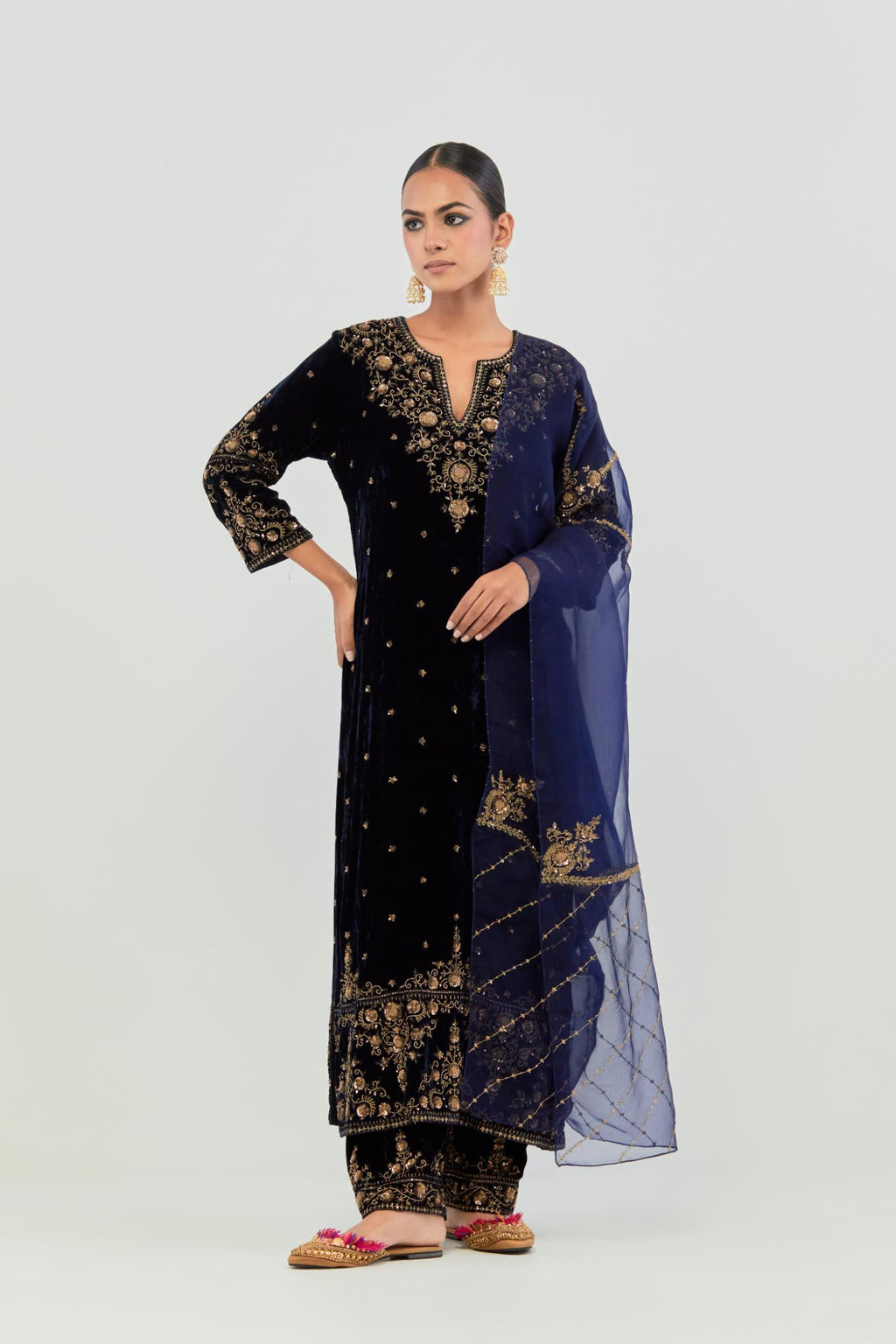 Navy straight Silk Velvet kurta set with all-over hand-embroidered bead, sequins and zari work.