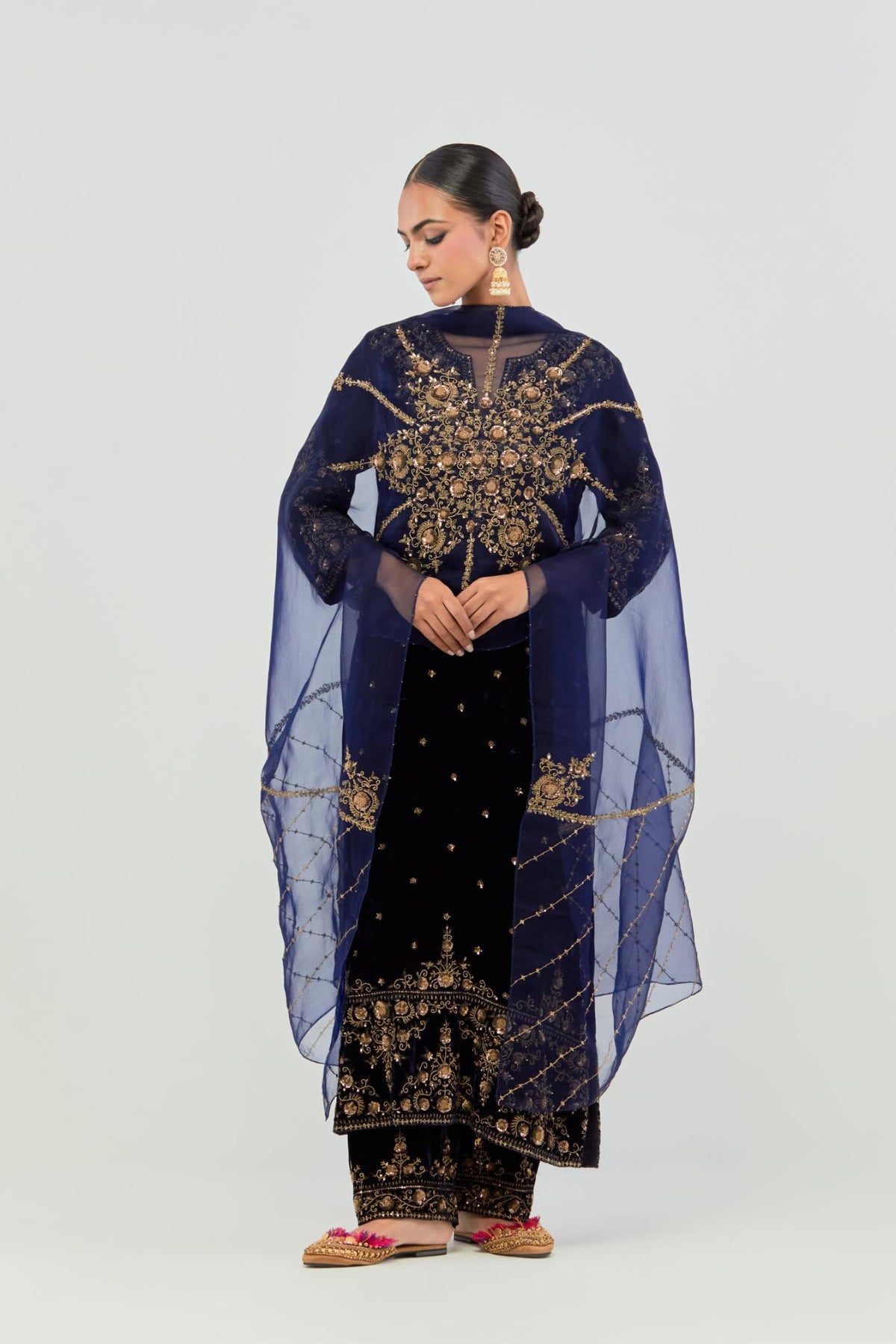 Navy straight Silk Velvet kurta set with all-over hand-embroidered bead, sequins and zari work.