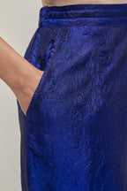 Blue Silk pants, highlighted with hand embroidered bead, sequins and zardozi boota at hem, highlighted with contrast bead work.