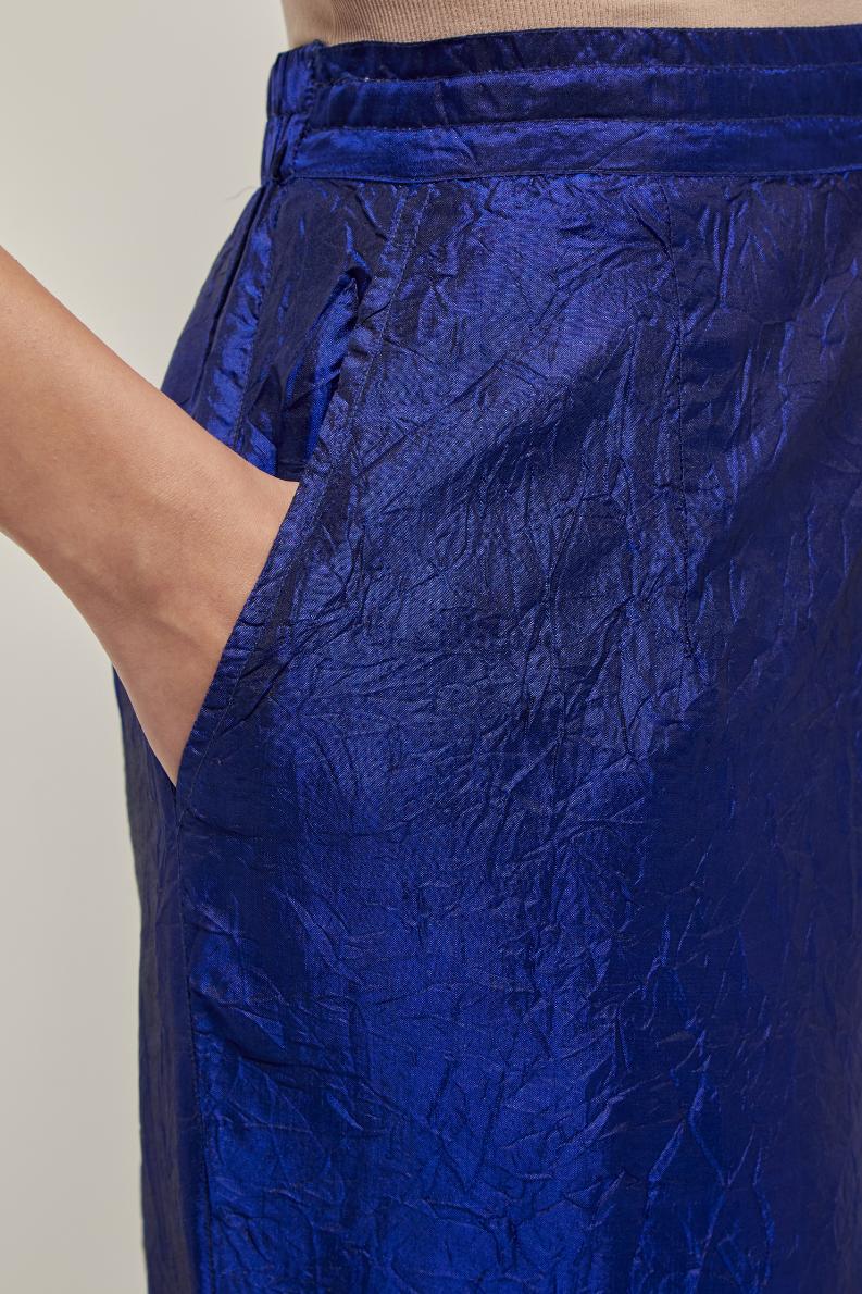 Blue Silk pants, highlighted with hand embroidered bead, sequins and zardozi boota at hem, highlighted with contrast bead work.