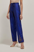 Blue Silk pants, highlighted with hand embroidered bead, sequins and zardozi boota at hem, highlighted with contrast bead work.