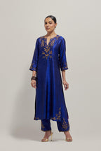 Blue double toned silk straight Kurta set with hand embroidered zardozi and sequins, highlighted with beads.
