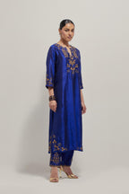 Blue double toned silk straight Kurta set with hand embroidered zardozi and sequins, highlighted with beads.