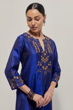 Blue double toned silk straight Kurta set with hand embroidered zardozi and sequins, highlighted with beads.
