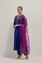 Blue double toned silk straight Kurta set with hand embroidered zardozi and sequins, highlighted with beads.