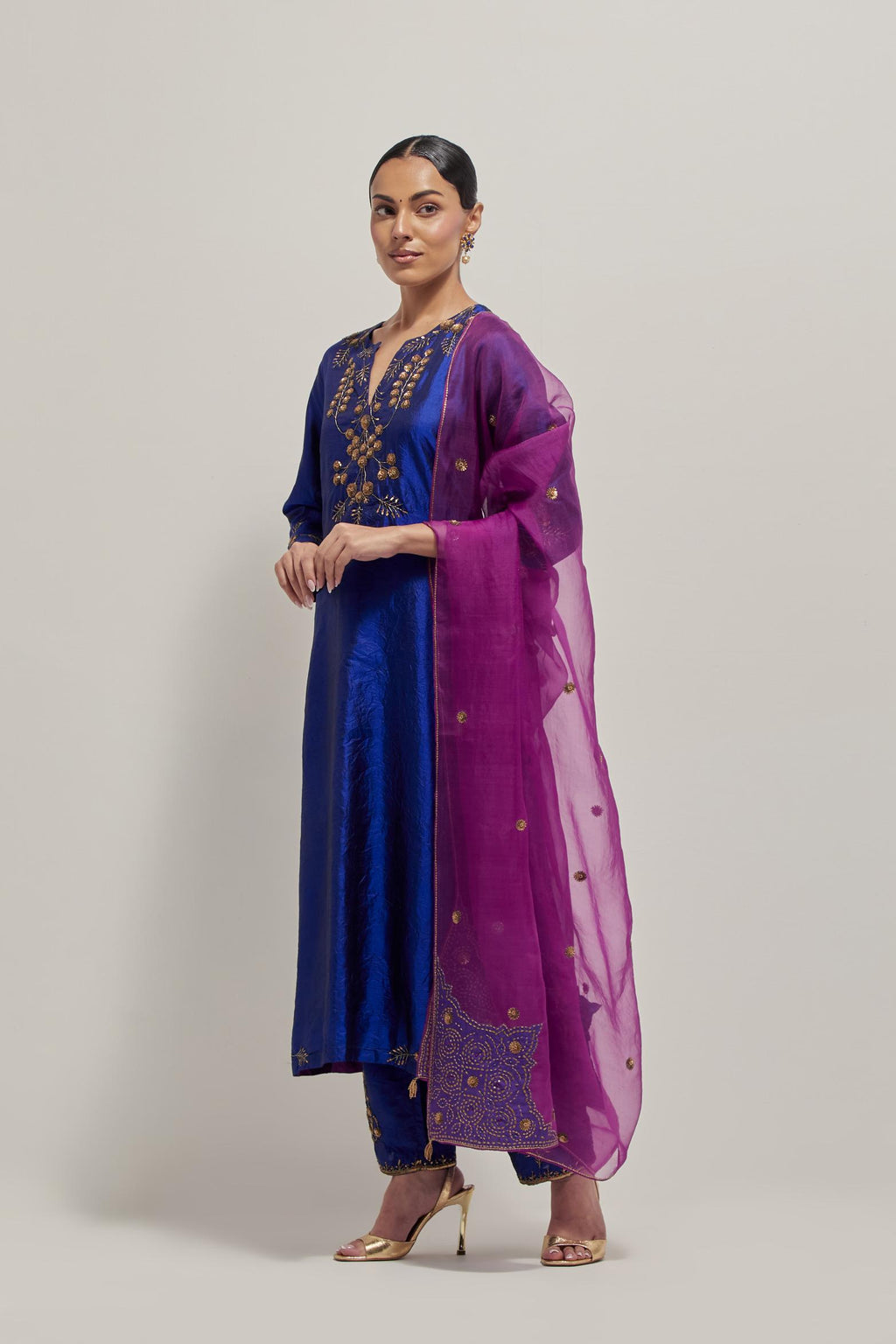 Blue double toned silk straight Kurta set with hand embroidered zardozi and sequins, highlighted with beads.