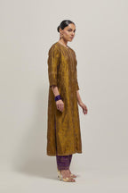 Olive Silk kurta set with all-over hand embroidered sequins on bandhani inspired floral jaal and small square booti at side panels, highlighted with contrast-colored beads.