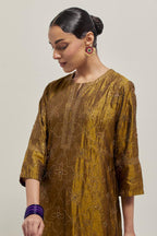 Olive Silk kurta set with all-over hand embroidered sequins on bandhani inspired floral jaal and small square booti at side panels, highlighted with contrast-colored beads.