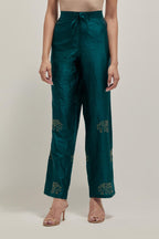 Teal Green silk pants with side pockets and assorted sequined elephants till mid-calf length.