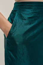 Teal Green silk pants with side pockets and assorted sequined elephants till mid-calf length.