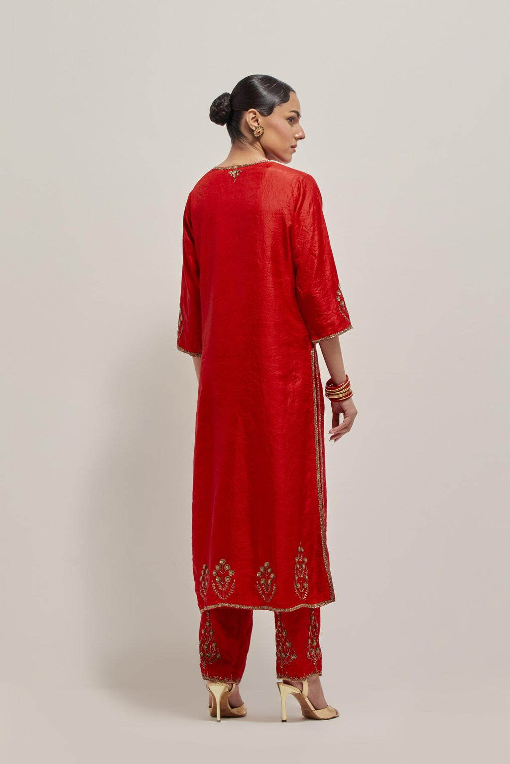 Red double toned silk straight Kurta set with hand embroidered zardozi and sequins, highlighted with beads.