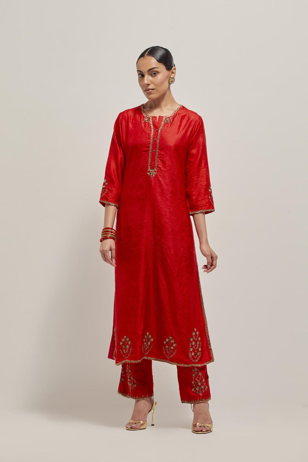 Red double toned silk straight Kurta set with hand embroidered zardozi and sequins, highlighted with beads.