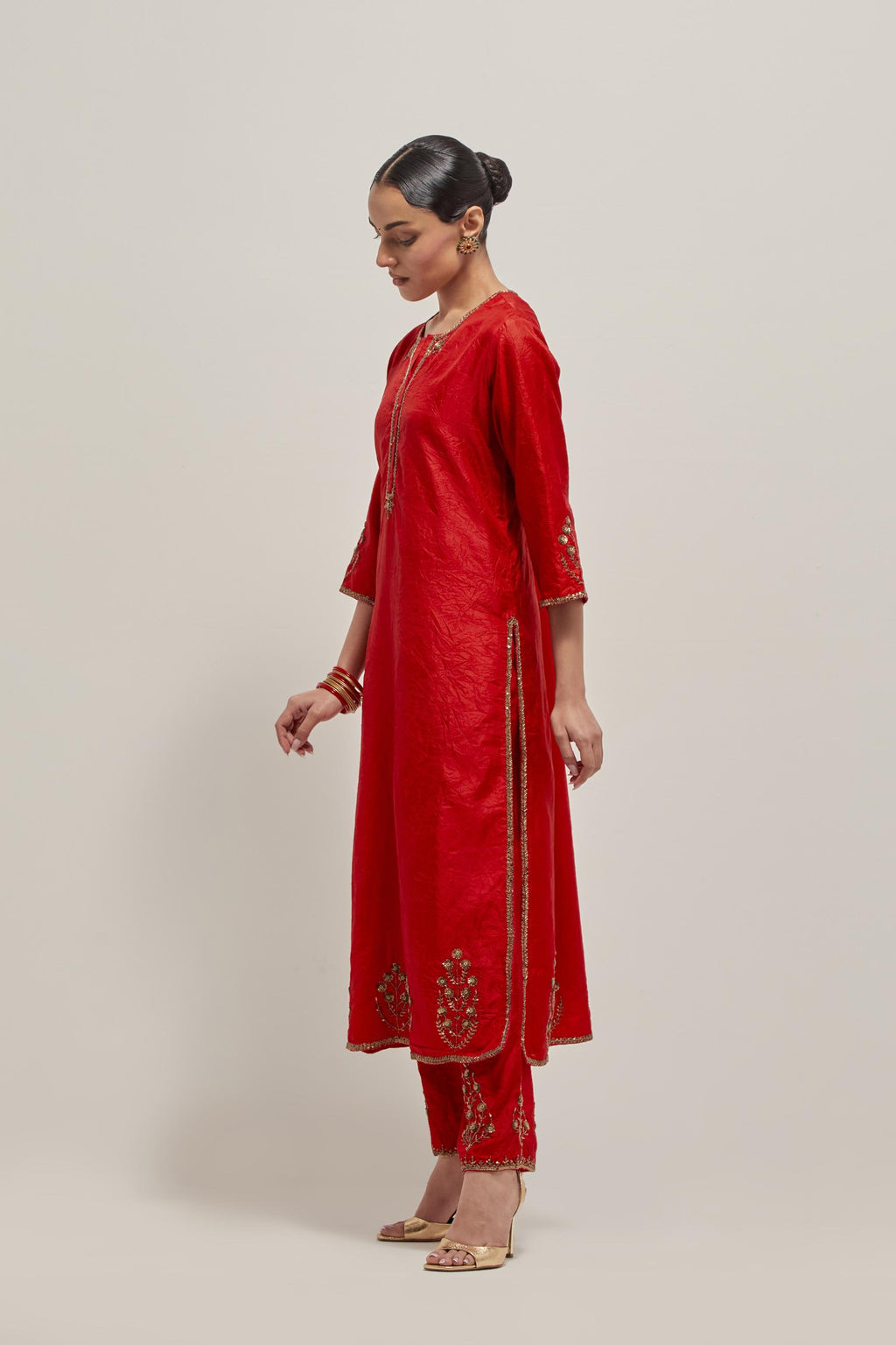 Red double toned silk straight Kurta set with hand embroidered zardozi and sequins, highlighted with beads.