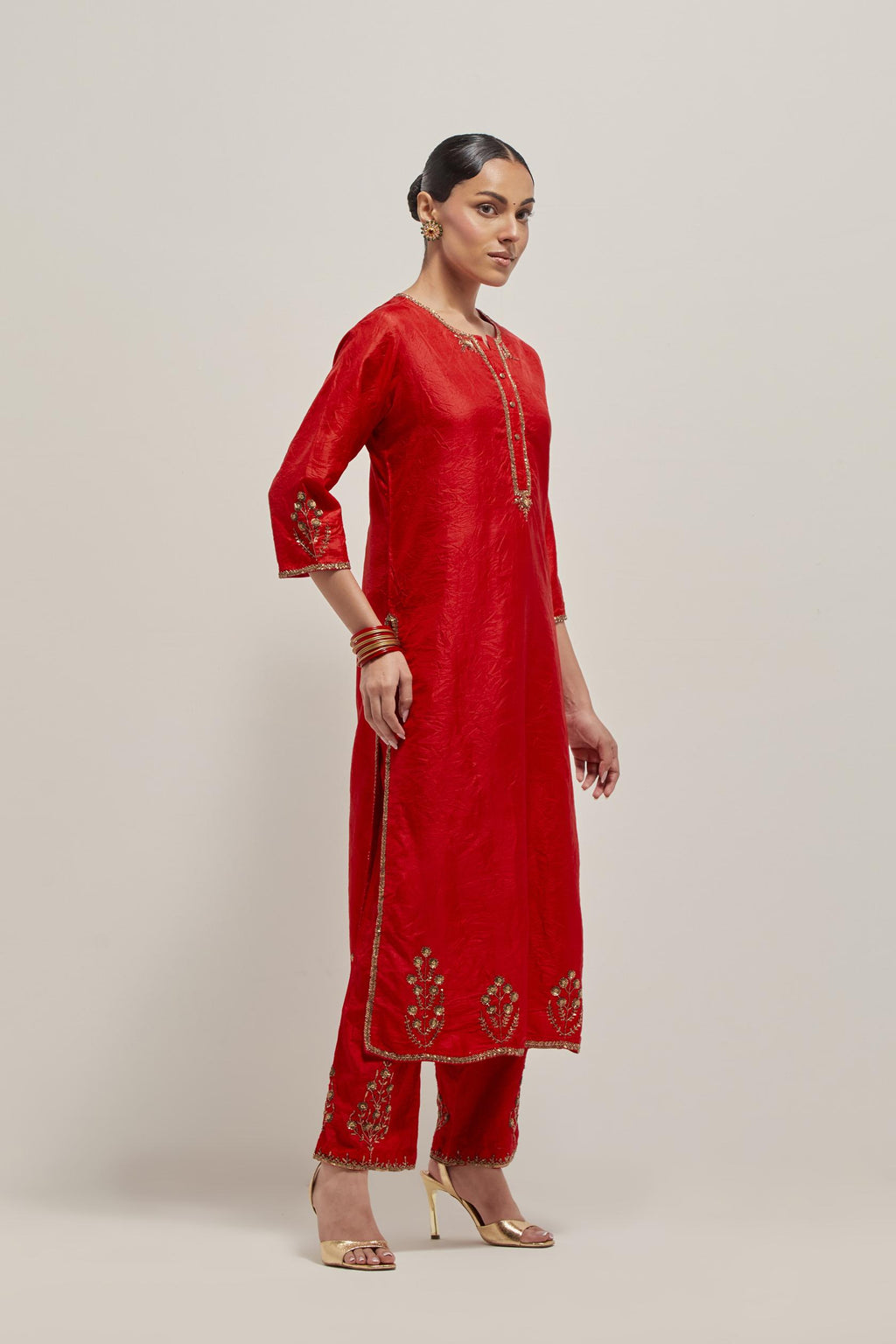Red double toned silk straight Kurta set with hand embroidered zardozi and sequins, highlighted with beads.