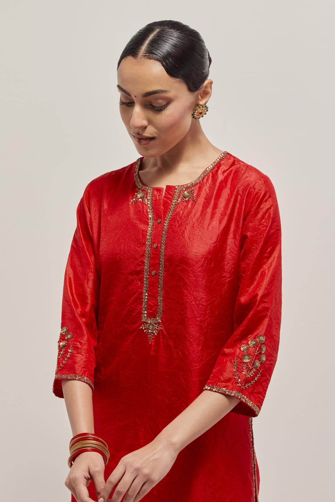 Red double toned silk straight Kurta set with hand embroidered zardozi and sequins, highlighted with beads.