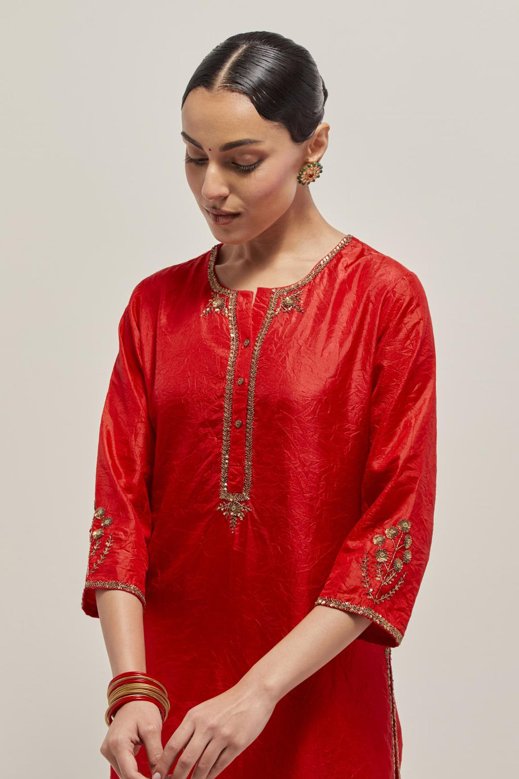Red double toned silk straight Kurta set with hand embroidered zardozi and sequins, highlighted with beads.