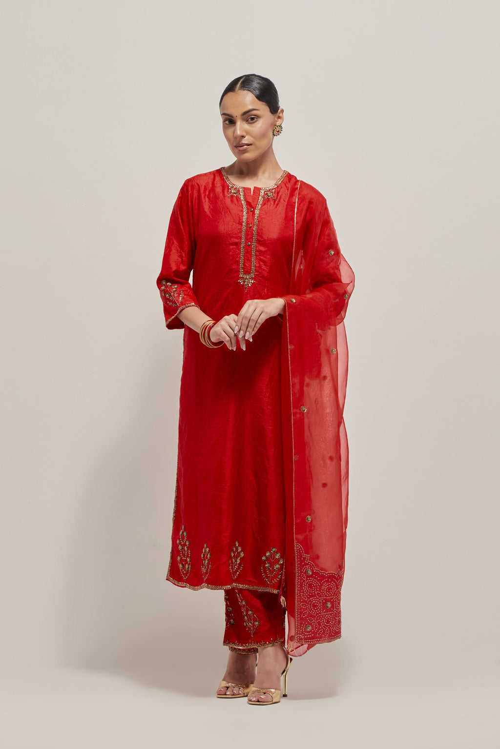 Red double toned silk straight Kurta set with hand embroidered zardozi and sequins, highlighted with beads.