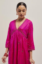 Fuchsia double toned silk kurta set with hand embroidered zardozi and sequins, highlighted with beads.