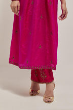 Fuchsia double toned silk kurta set with hand embroidered zardozi and sequins, highlighted with beads.