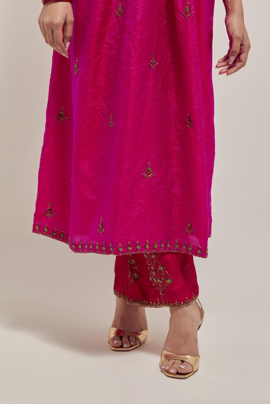 Fuchsia double toned silk kurta set with hand embroidered zardozi and sequins, highlighted with beads.