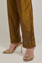 Olive Silk pants, highlighted with hand embroidered bead, sequins and zardozi boota at hem, highlighted with contrast bead work.
