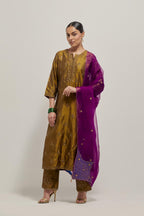 Olive double toned silk straight kurta set with all-over hand embroidered zardozi and sequins work, highlighted with beads.