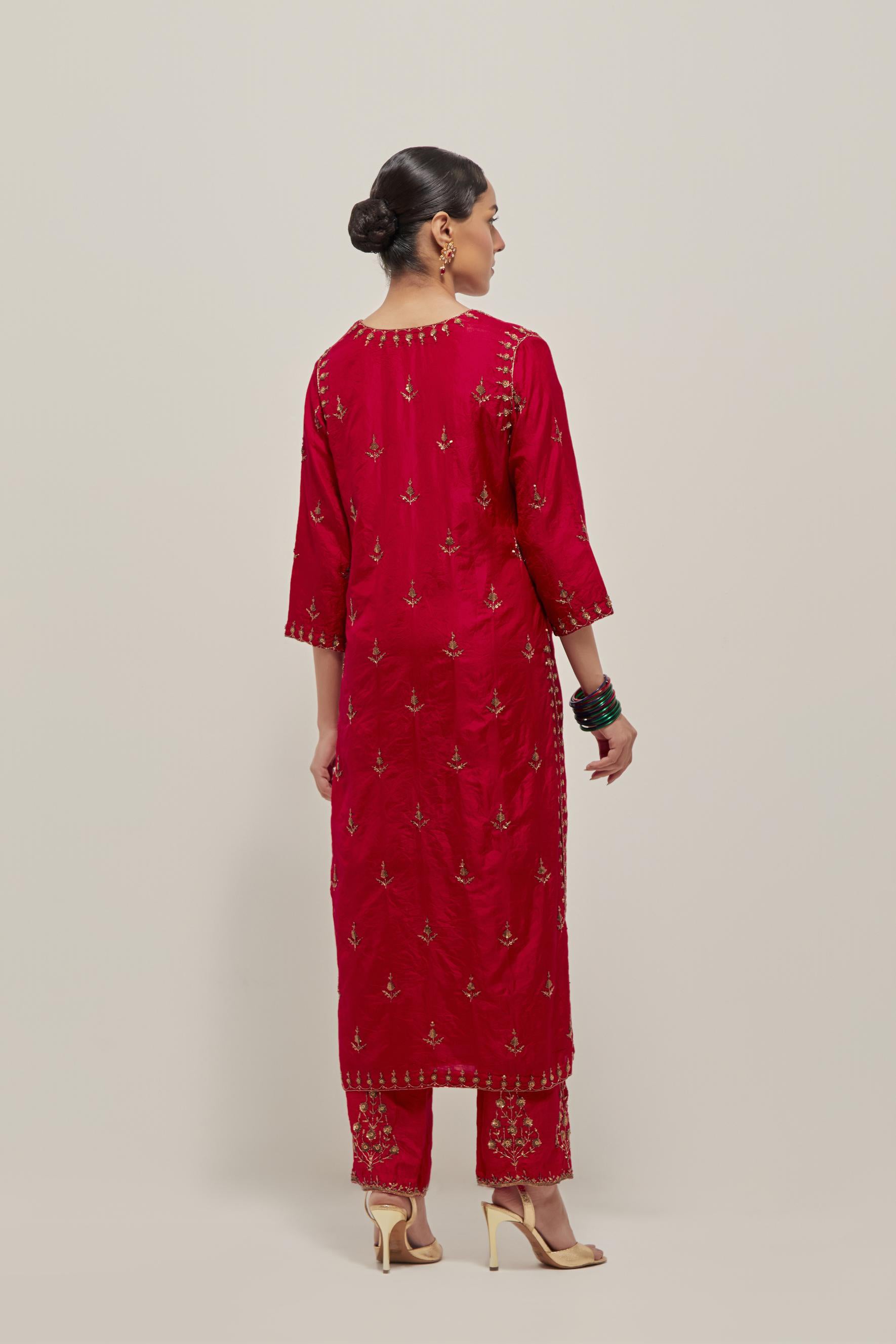 Red double toned silk straight kurta set with all-over hand embroidered zardozi and sequins work, highlighted with beads.