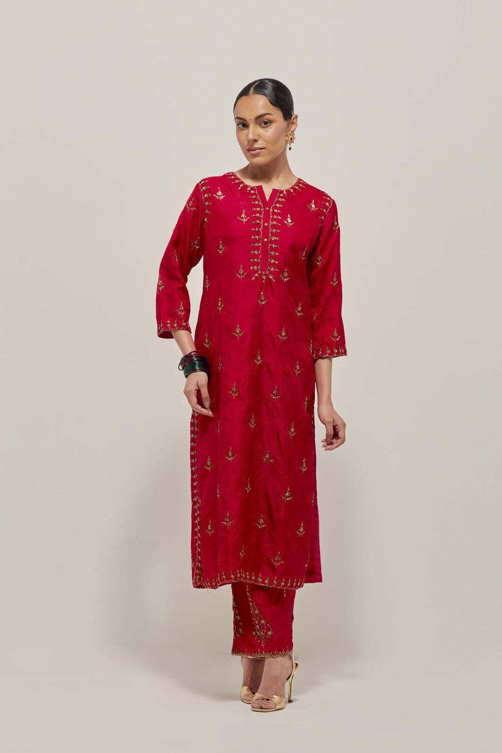 Red double toned silk straight kurta set with all-over hand embroidered zardozi and sequins work, highlighted with beads.