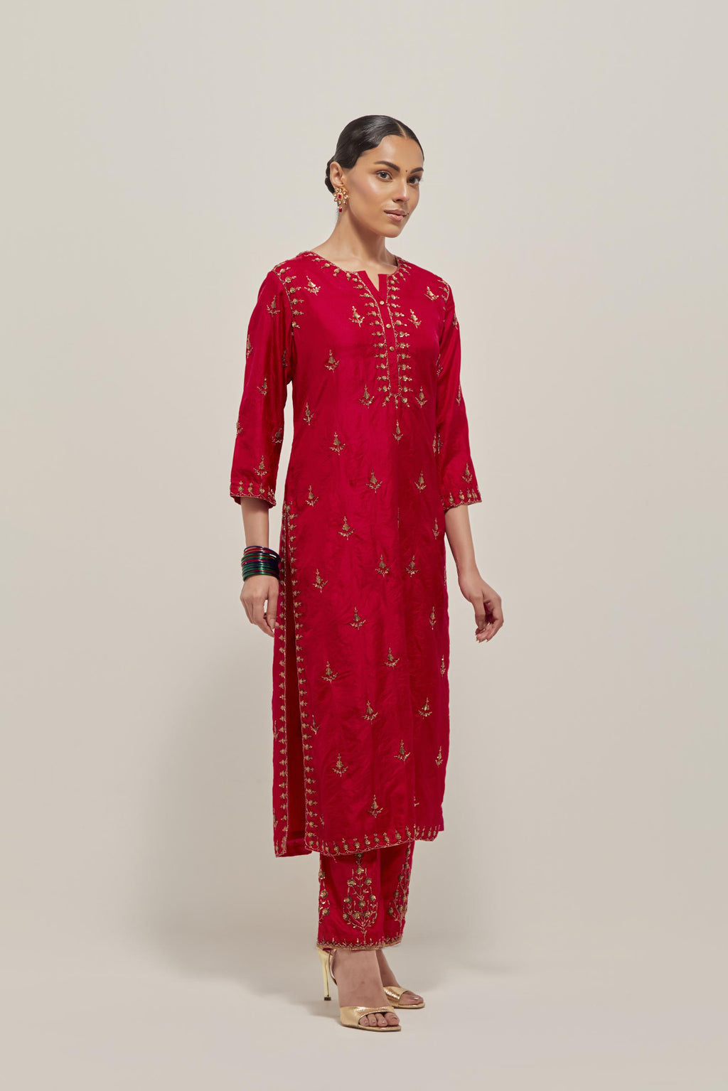 Red double toned silk straight kurta set with all-over hand embroidered zardozi and sequins work, highlighted with beads.