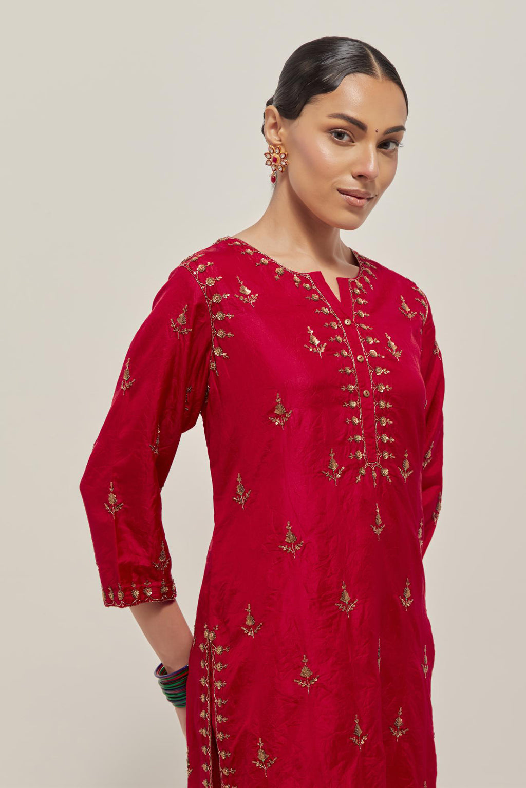 Red double toned silk straight kurta set with all-over hand embroidered zardozi and sequins work, highlighted with beads.