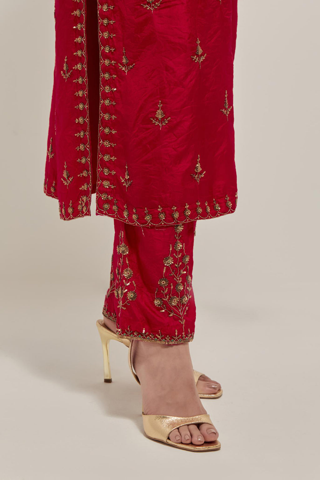 Red double toned silk straight kurta set with all-over hand embroidered zardozi and sequins work, highlighted with beads.