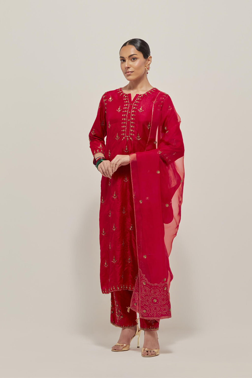 Red double toned silk straight kurta set with all-over hand embroidered zardozi and sequins work, highlighted with beads.