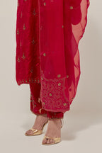 Red silk organza dupatta with all-over delicate sequins and bead small booti, finished with applique bandhani-inspired motifs at all four corners.