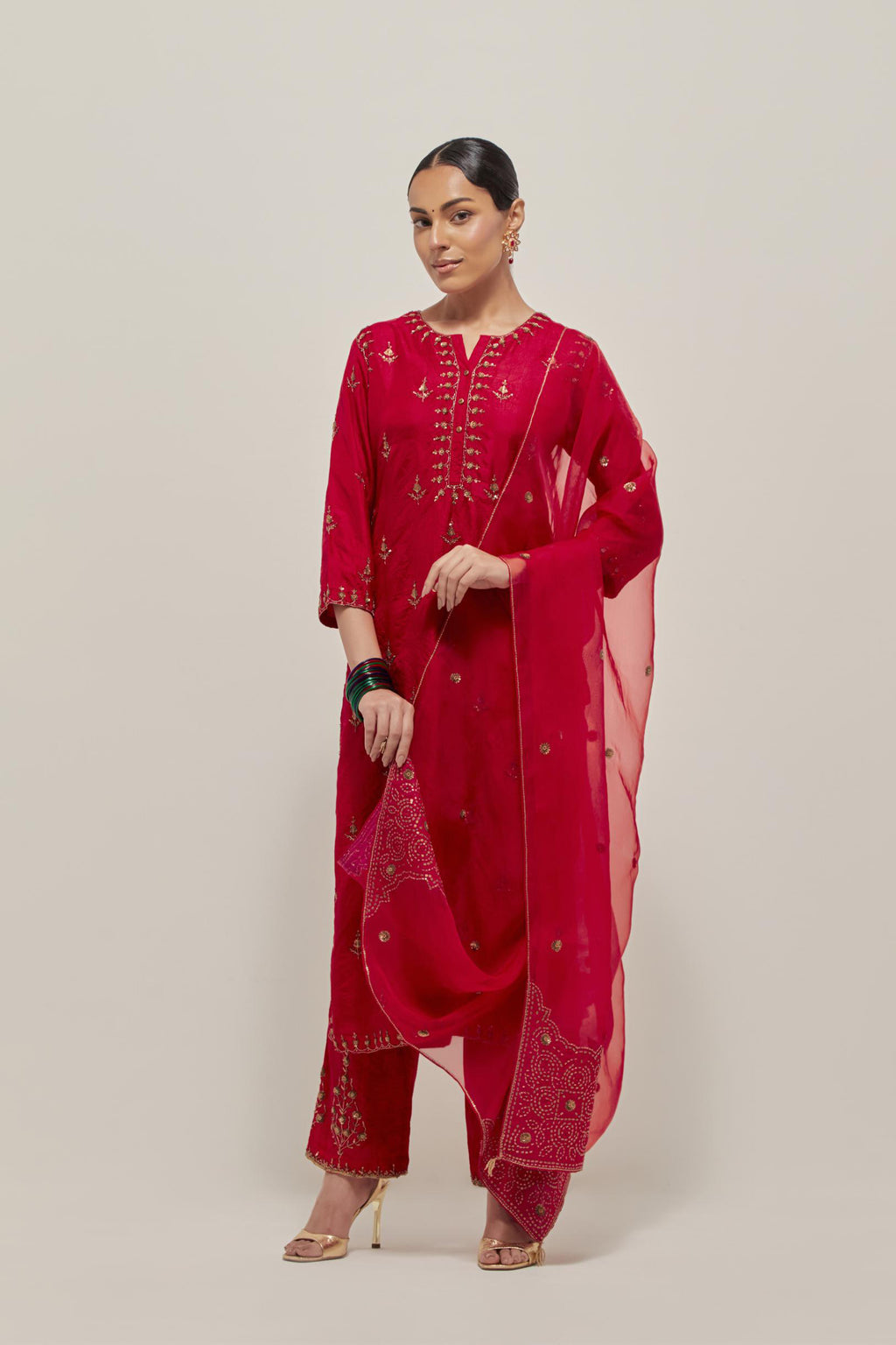 Red double toned silk straight kurta set with all-over hand embroidered zardozi and sequins work, highlighted with beads.