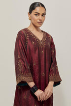 Maroon double toned silk easy fit short kurta set with hand embroidered zardozi and sequins, highlighted with beads.