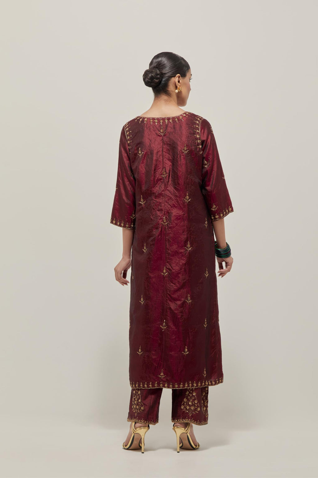 Marron double toned silk Kurta set dress with all-over hand embroidered zardozi and sequins, highlighted with beads.