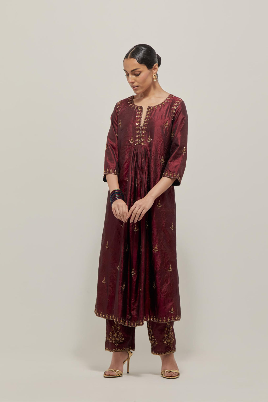 Marron double toned silk Kurta set dress with all-over hand embroidered zardozi and sequins, highlighted with beads.