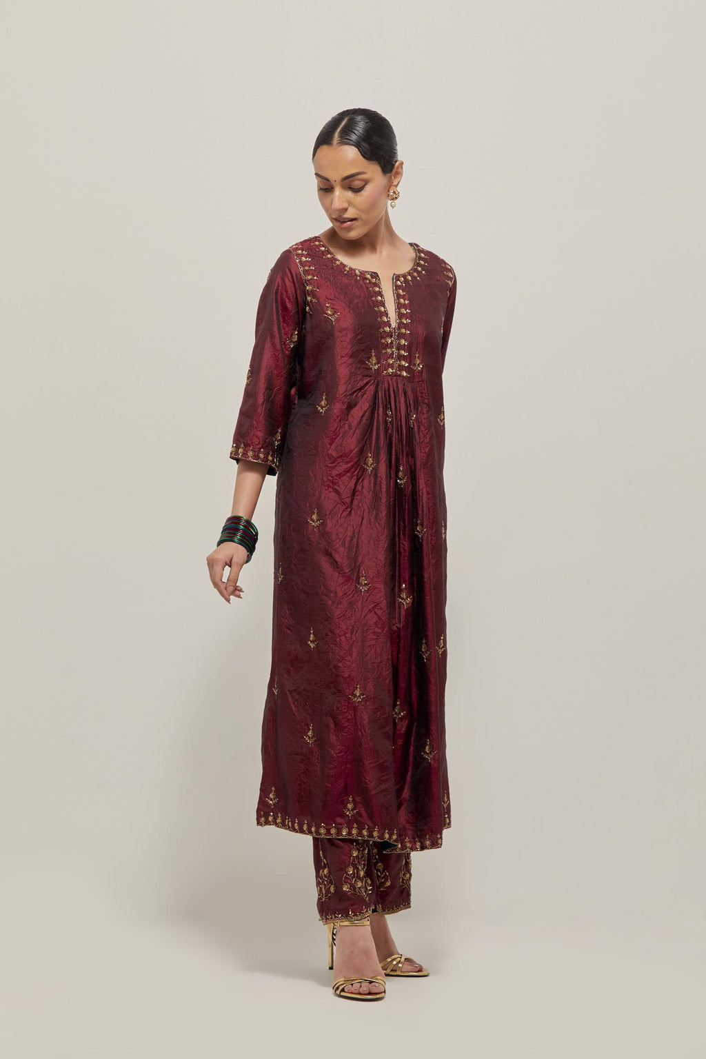 Marron double toned silk Kurta set dress with all-over hand embroidered zardozi and sequins, highlighted with beads.