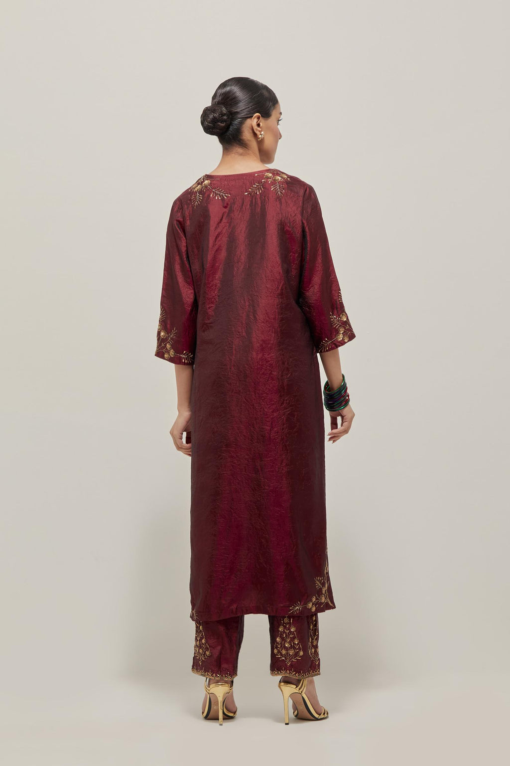 Maroon double toned silk straight Kurta set with hand embroidered zardozi and sequins, highlighted with beads.