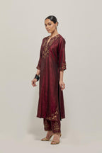Maroon double toned silk straight Kurta set with hand embroidered zardozi and sequins, highlighted with beads.