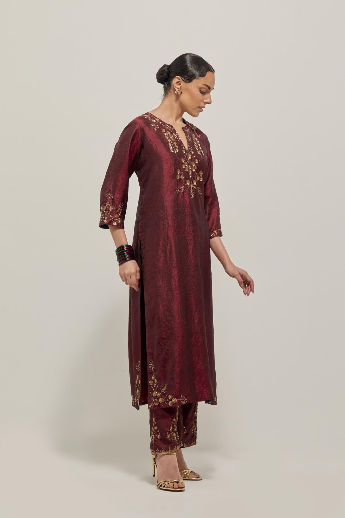 Maroon double toned silk straight Kurta set with hand embroidered zardozi and sequins, highlighted with beads.