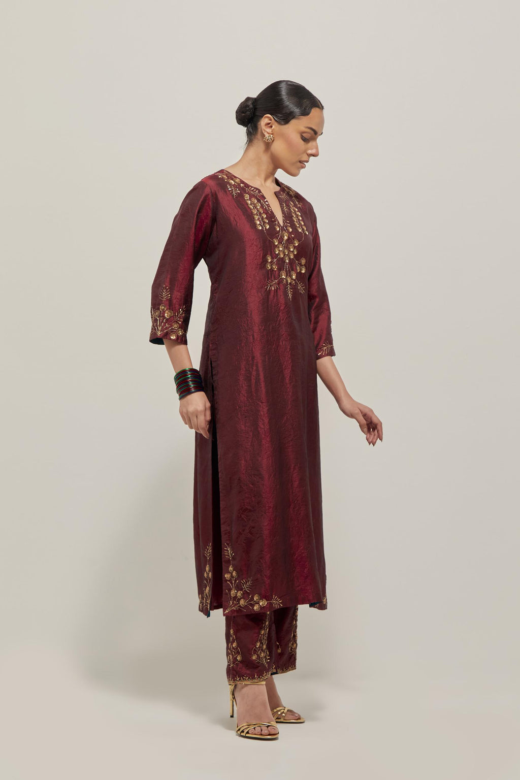 Maroon double toned silk straight Kurta set with hand embroidered zardozi and sequins, highlighted with beads.