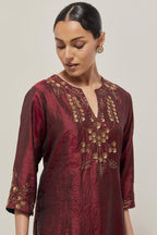 Maroon double toned silk straight Kurta set with hand embroidered zardozi and sequins, highlighted with beads.