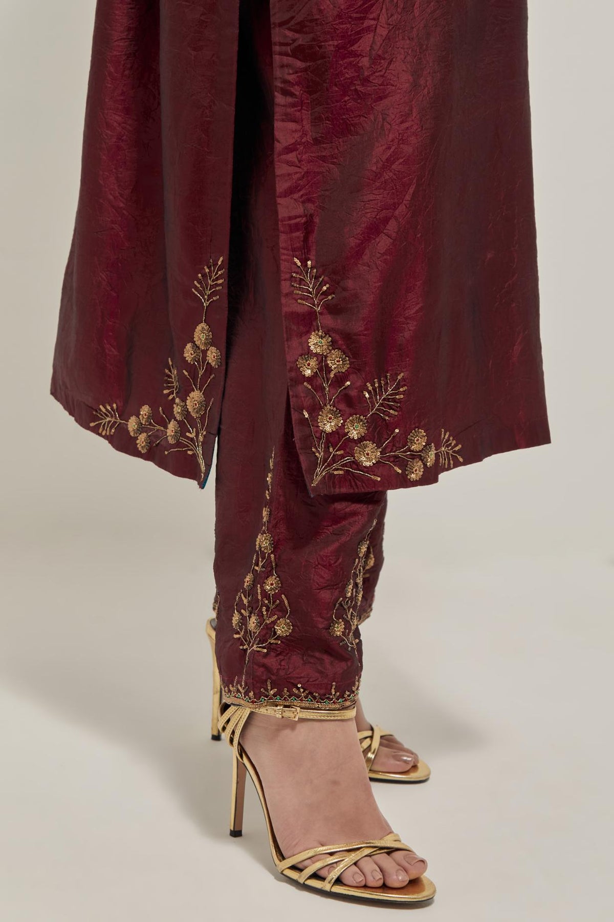 Maroon double toned silk straight Kurta set with hand embroidered zardozi and sequins, highlighted with beads.