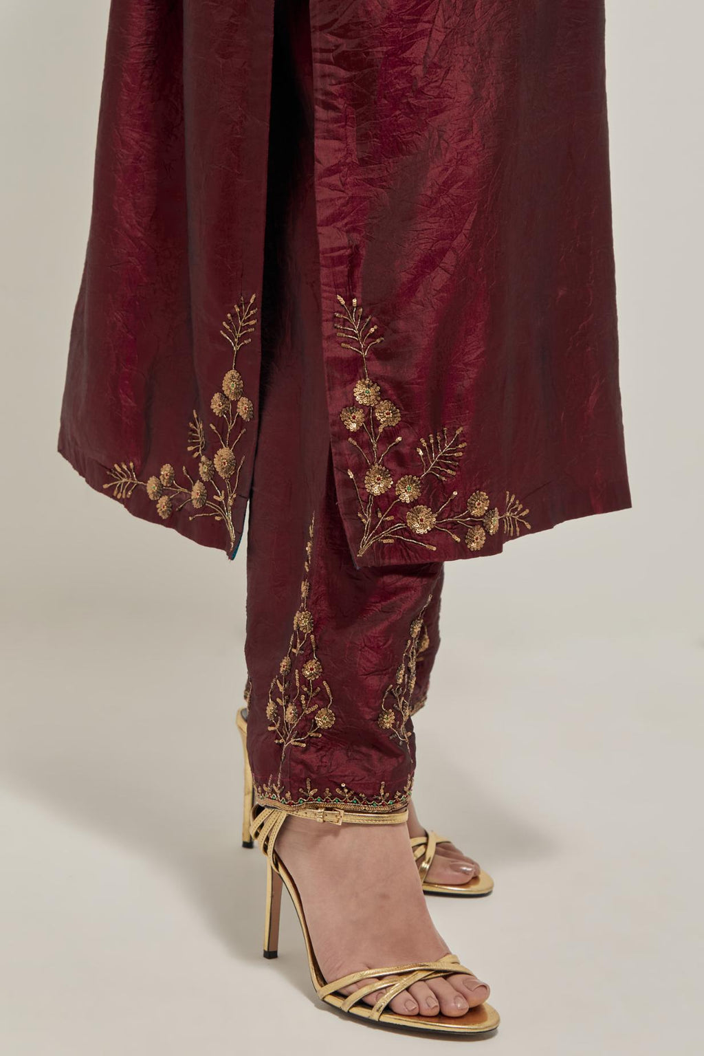 Maroon double toned silk straight Kurta set with hand embroidered zardozi and sequins, highlighted with beads.