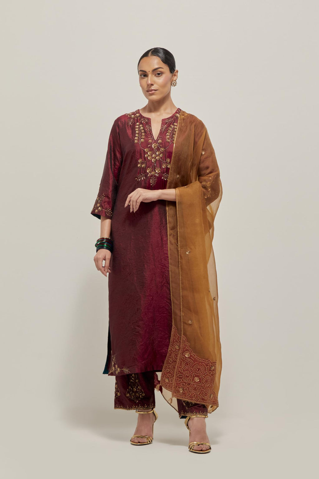 Olive silk organza dupatta with all-over delicate sequins and bead small booti, finished with applique bandhani-inspired motifs at all four corners.