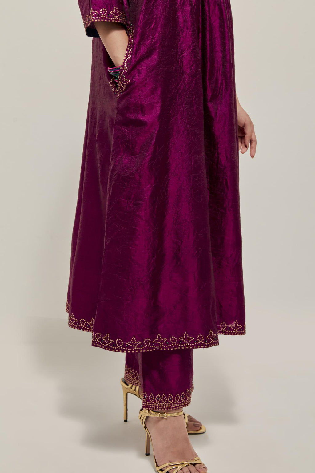 Purple Silk kurta dress set  with hand embroidered sequins on bandhani inspired jaal work at neck, hem and sleeves cuff, highlighted with contrast-colored beads.